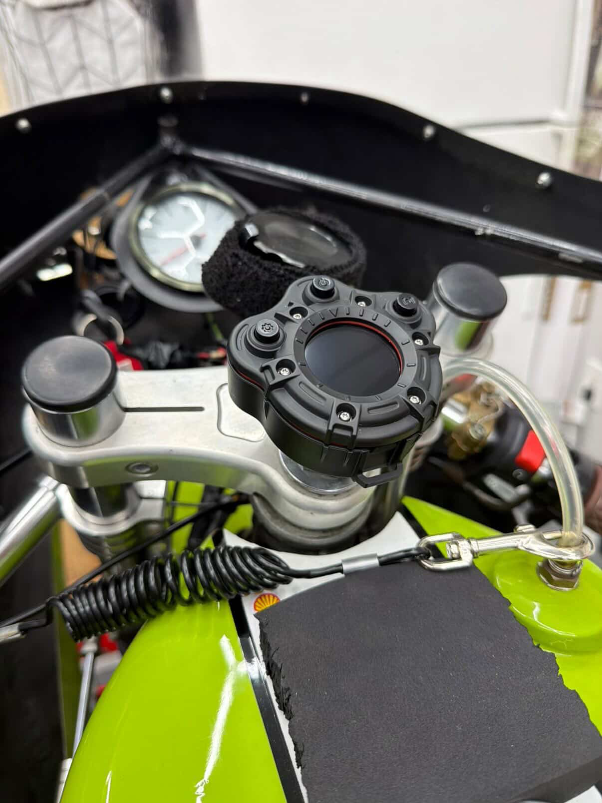 Quasar device mounted on a motorcycle cockpit