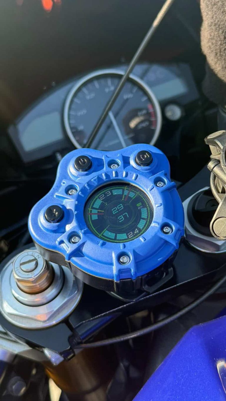 Blue Quasar device mounted on a motorcycle cockpit
